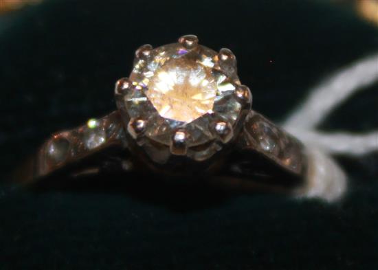 A mid 20th century 18ct gold and platinum single stone diamond ring, size F.